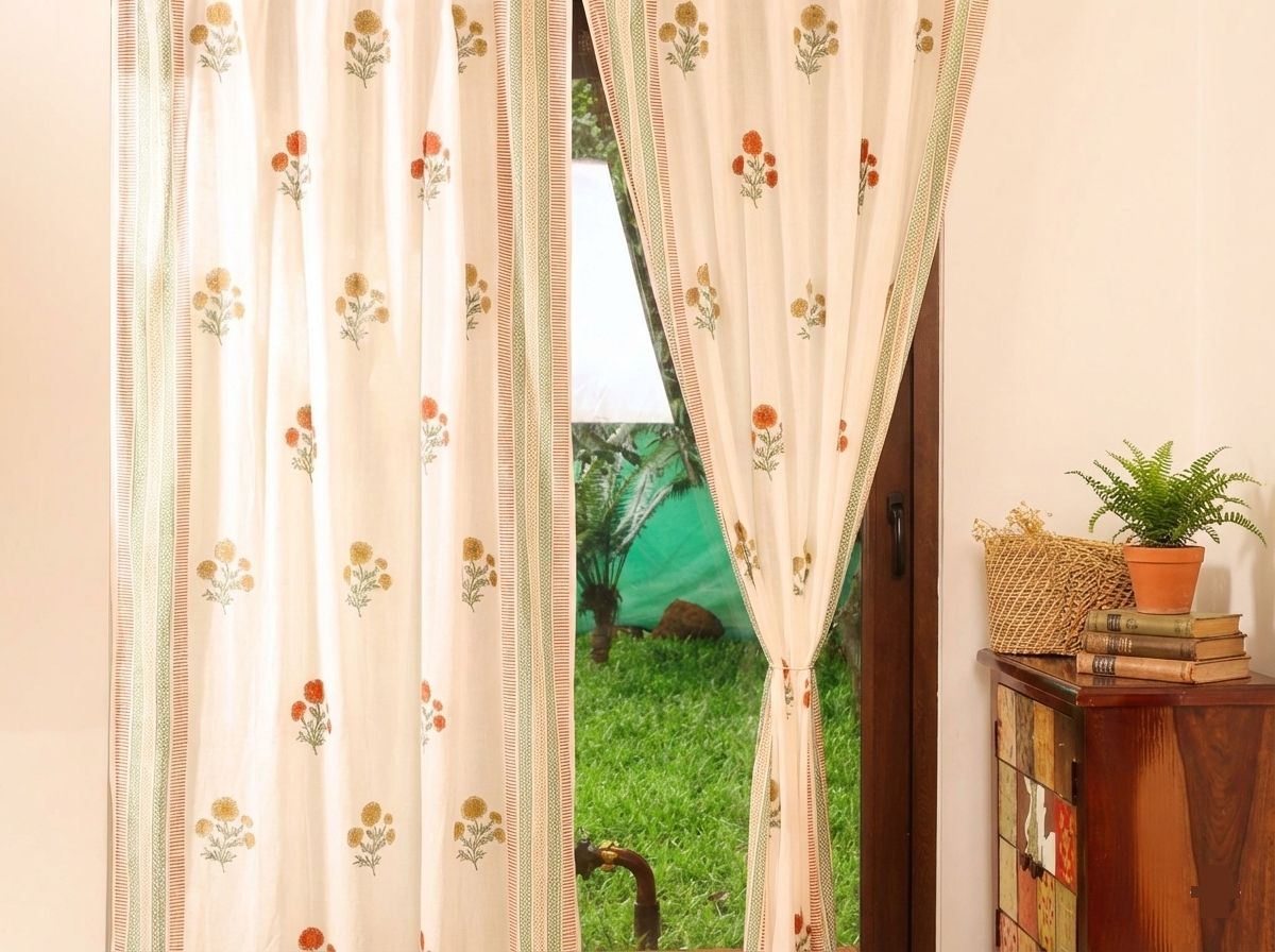 Patterned sheer curtains adding light elegance to a Bangalore home interior