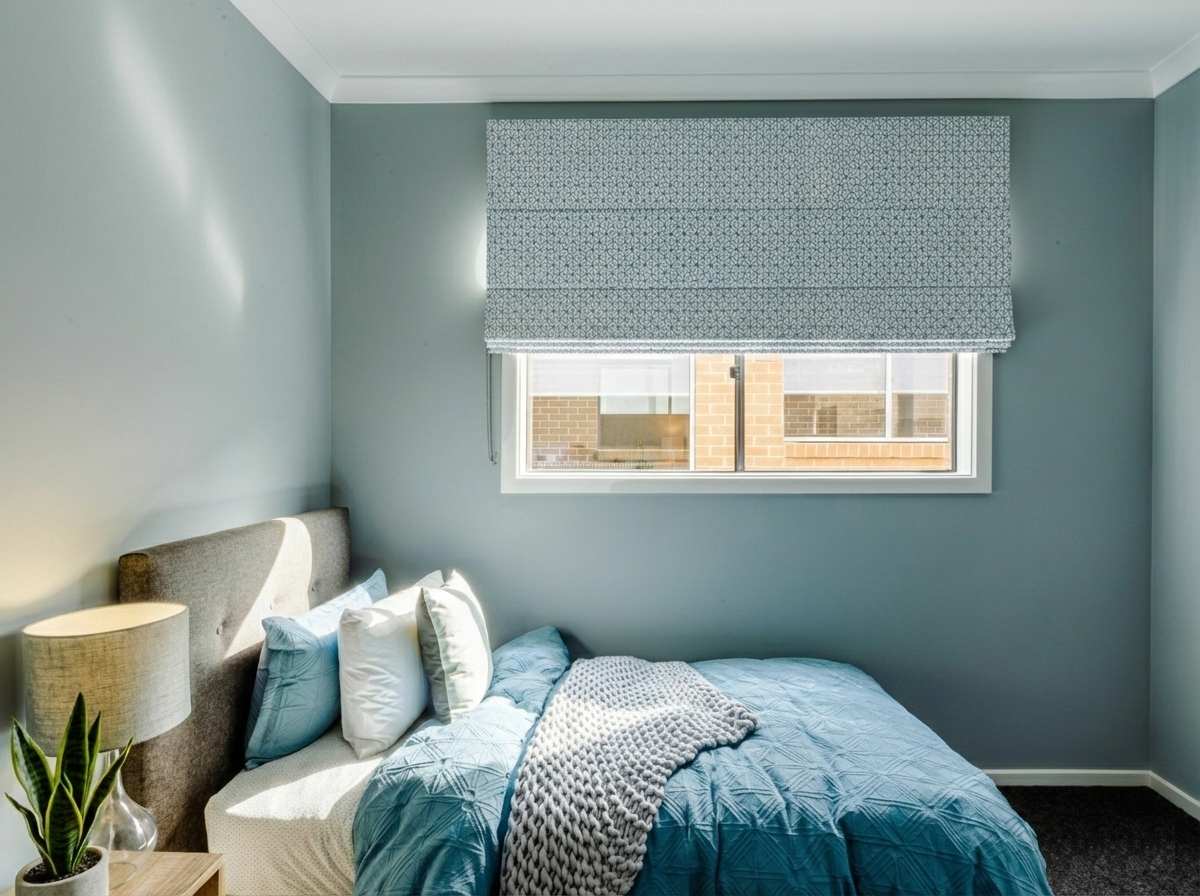 Custom Roman blinds as elegant window treatment